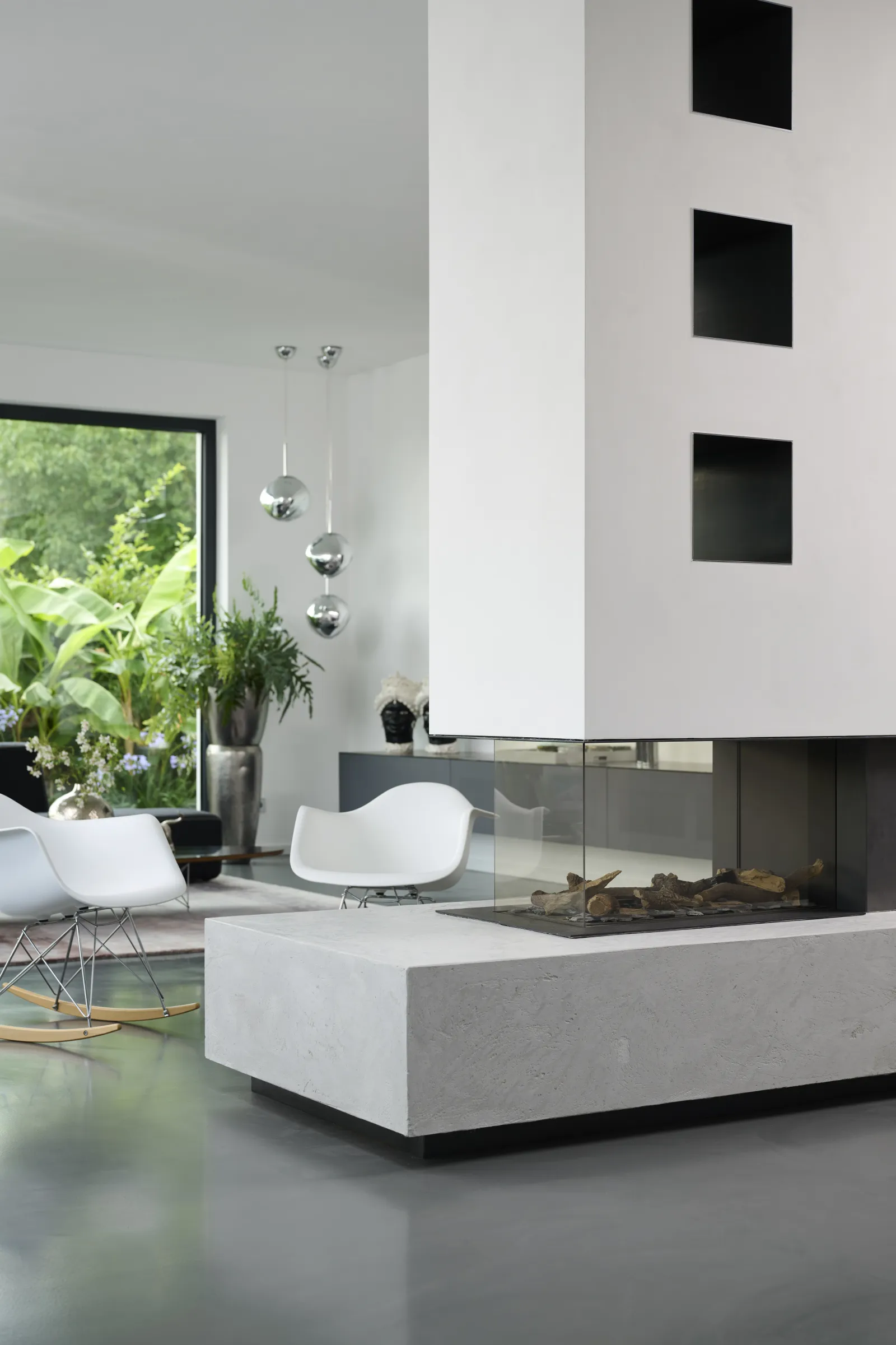 Bodenleger München - polierter Designboden im Wohnbereich mit Kamin